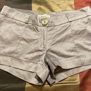 These are short shorts. They are a shiny dark grey color, like pewter. Size: 3